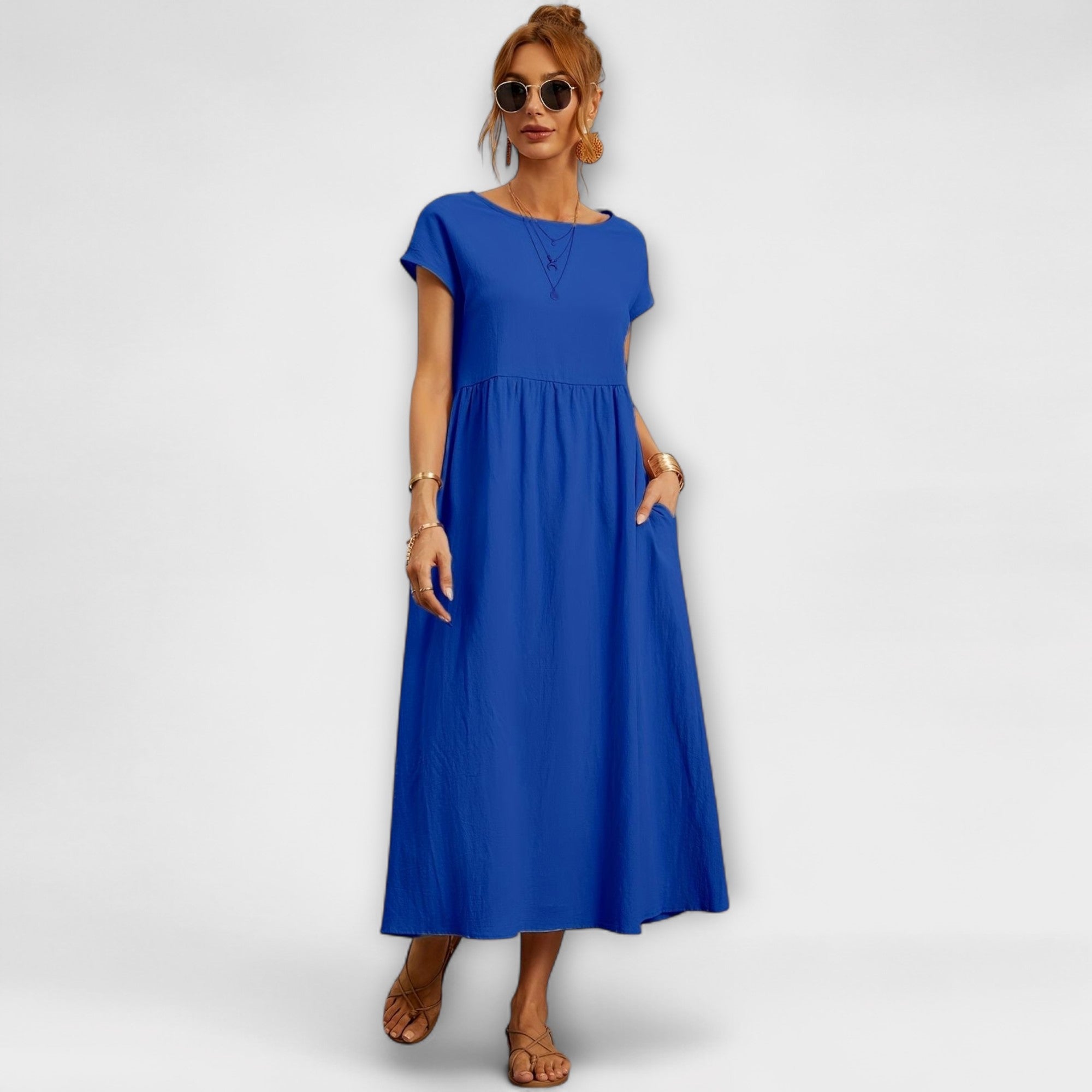 Robe Midi avec Ligne Simple et Poches Latérales