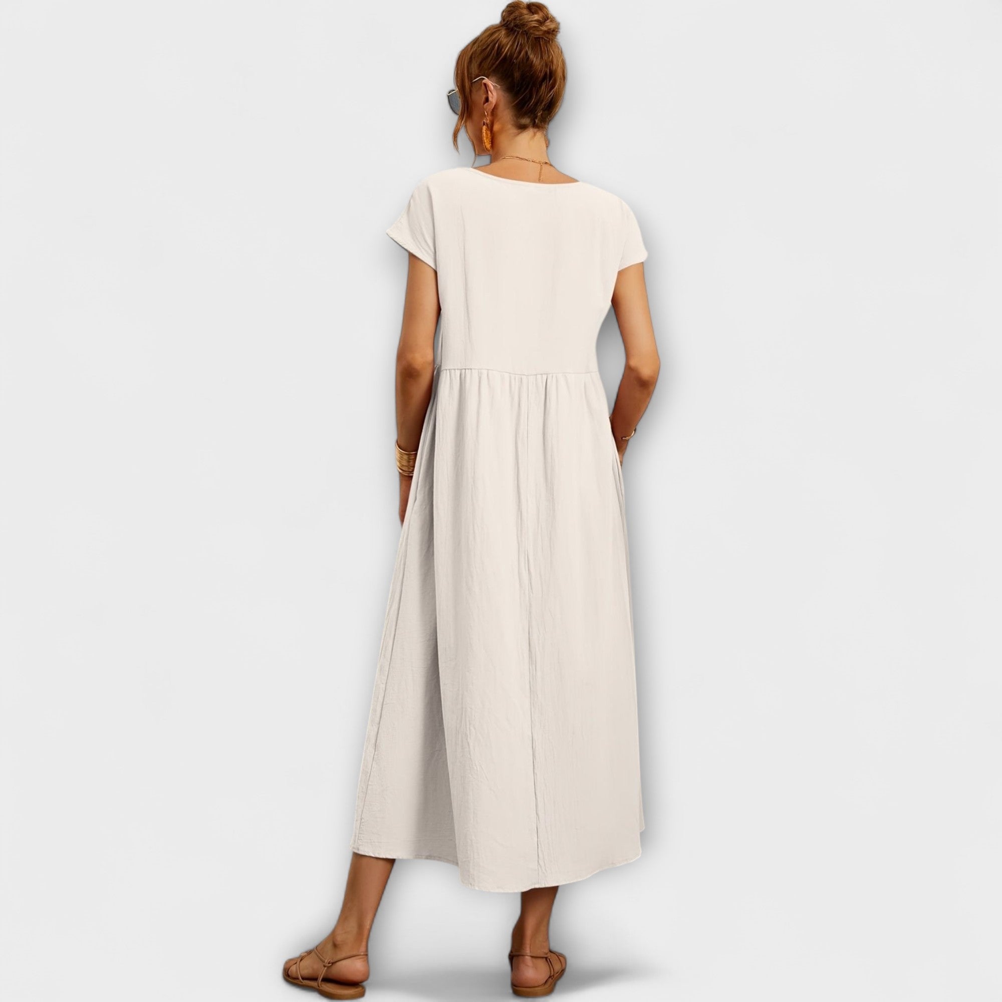 Robe Midi avec Ligne Simple et Poches Latérales