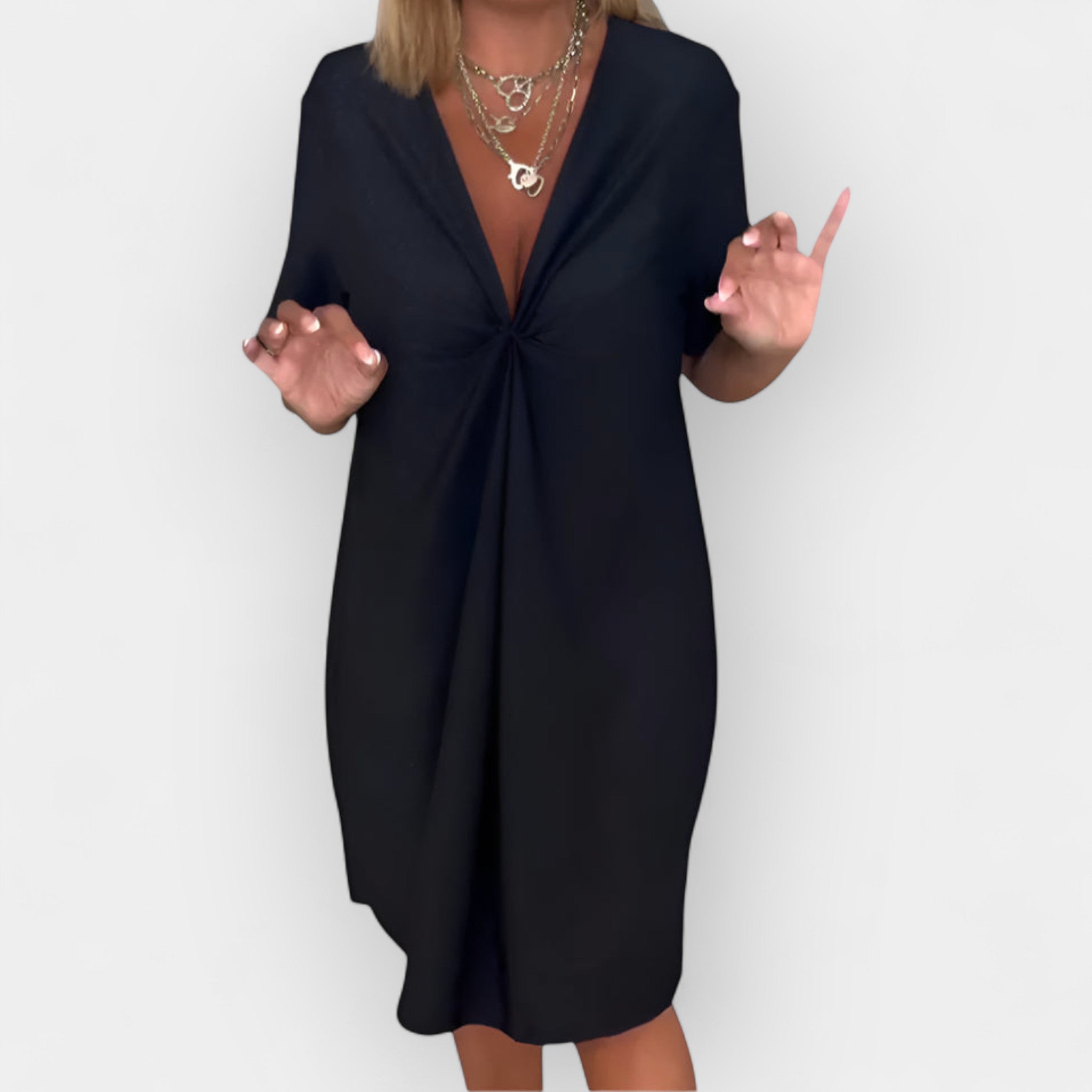 Robe élégante avec décolleté en V et ourlet décoratif